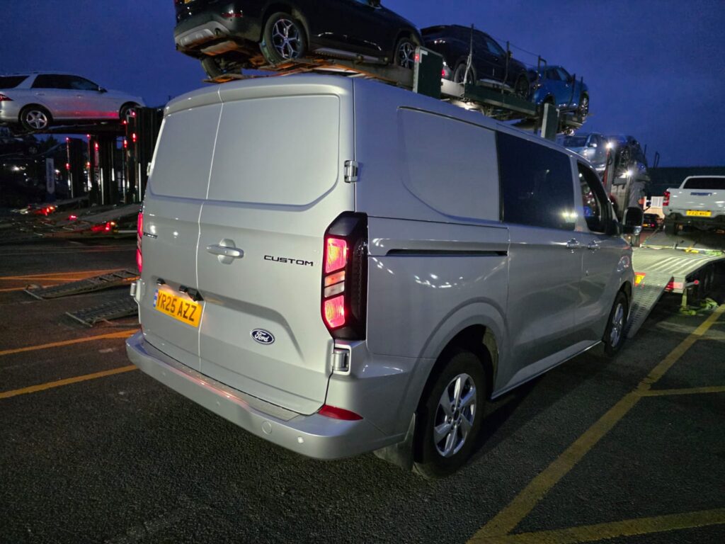 auction vehicle collection UK loading vehicles at auction site