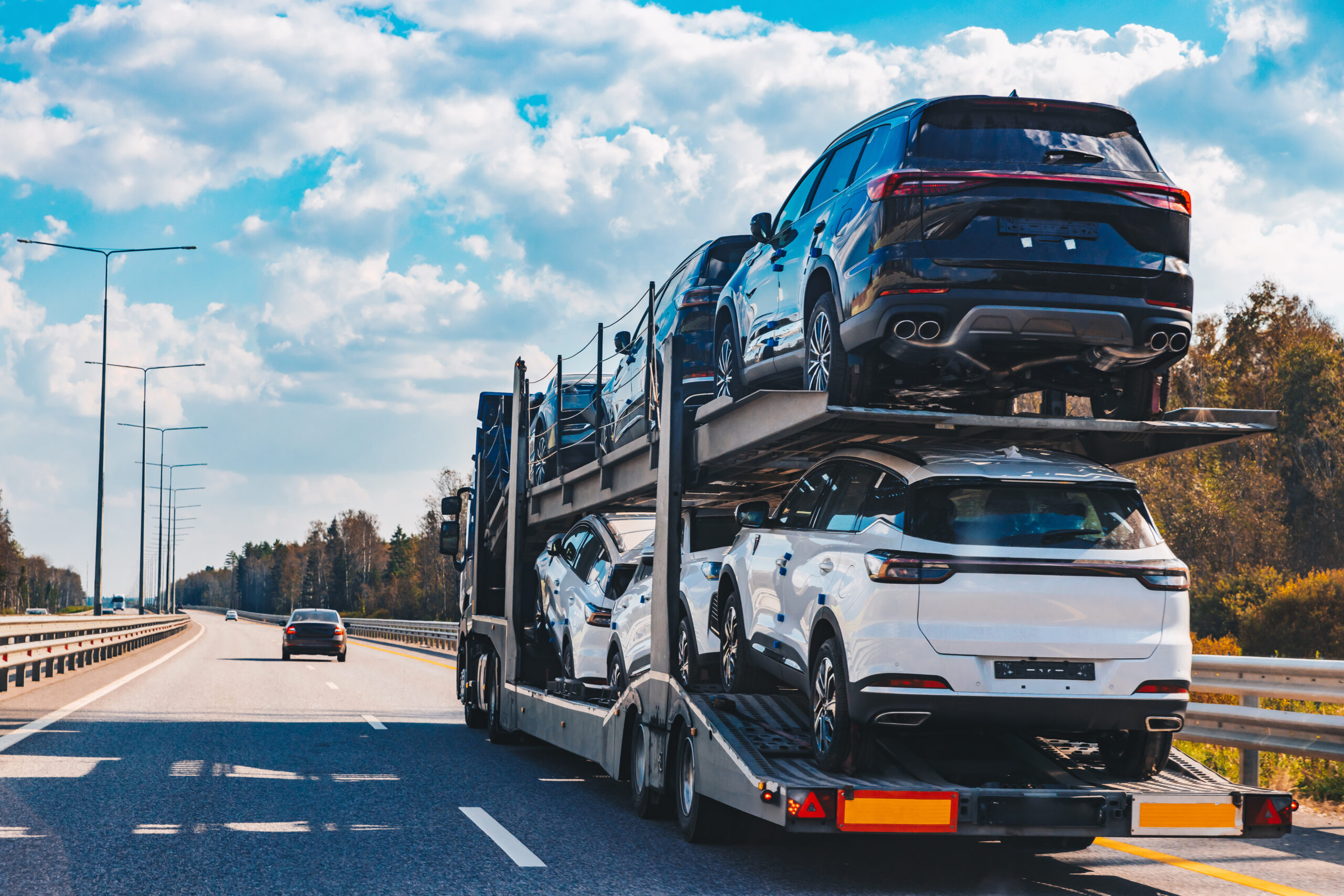 Car transport cost UK vehicle transporter by Elite Chariots Automotive Ltd
