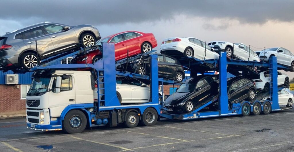 Car transporter delivering vehicles between Scotland and England